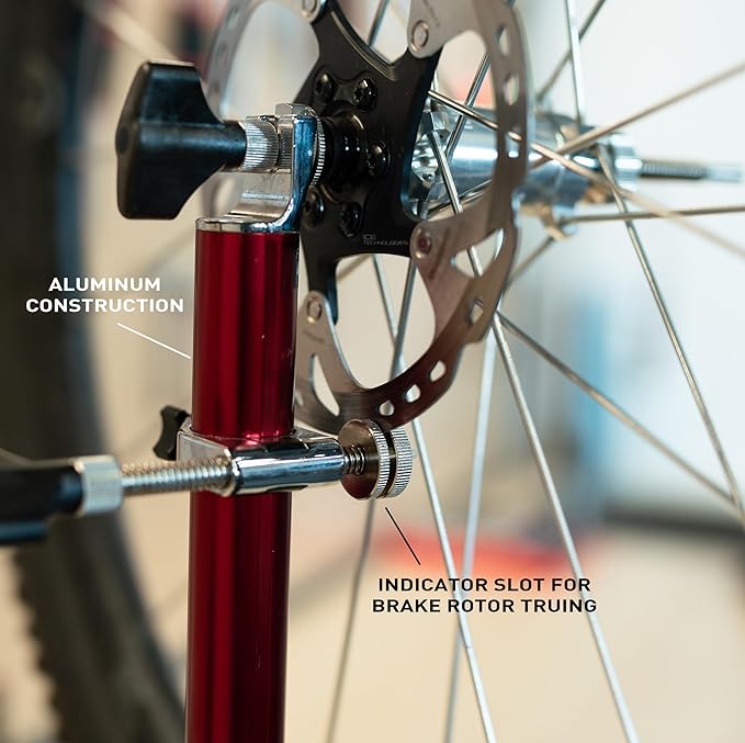 FEEDBACK SPORTS | Pro Truing Stand with Thru Axle Adapter | Compact and Portable Lightweight Aluminum | Integrates With Repair Stand | Precision Spring-Loaded Tip Verifies Lateral True